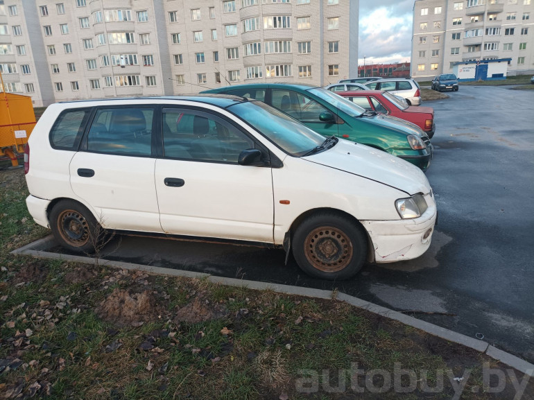Mitsubishi Space Star 1 поколение, 2002 года