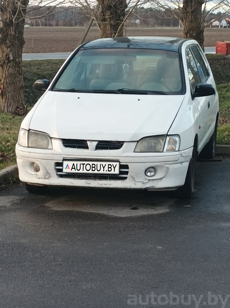 Mitsubishi Space Star 1 поколение, 2002 года
