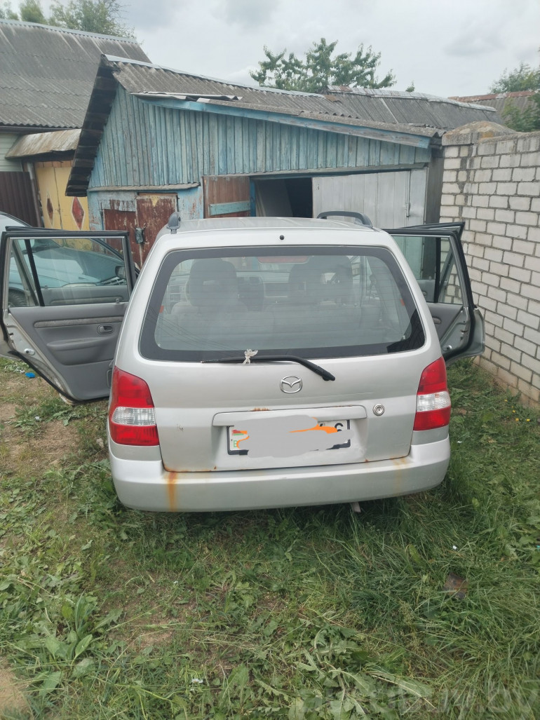 Mazda Demio 1 поколение (DW), 2001 года