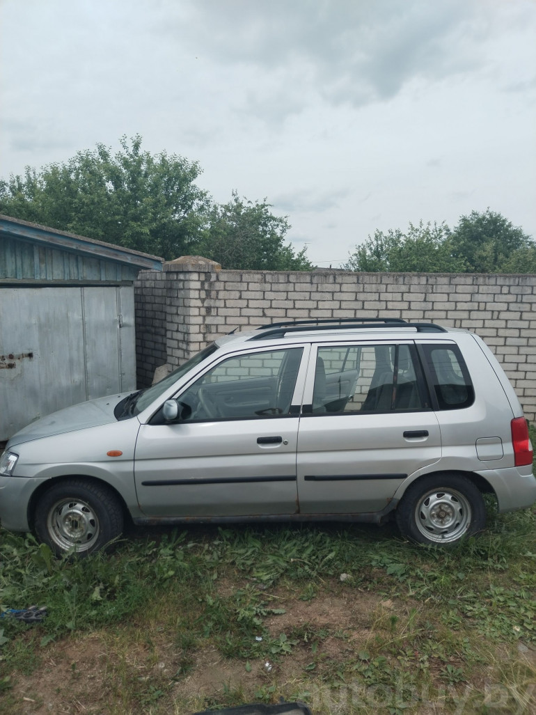 Mazda Demio 1 поколение (DW), 2001 года
