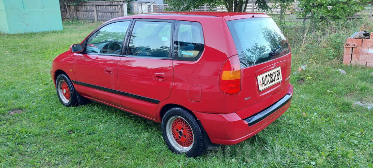 Mitsubishi Space Star 1 поколение, 1999 года