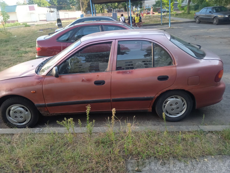 Hyundai Accent 1 поколение, 1995 года