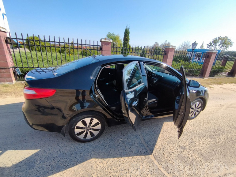 Kia Rio 3 поколение, 2014 года