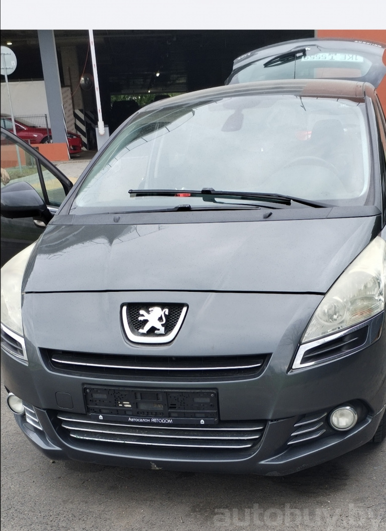 Peugeot 5008 1 поколение, 2009 года