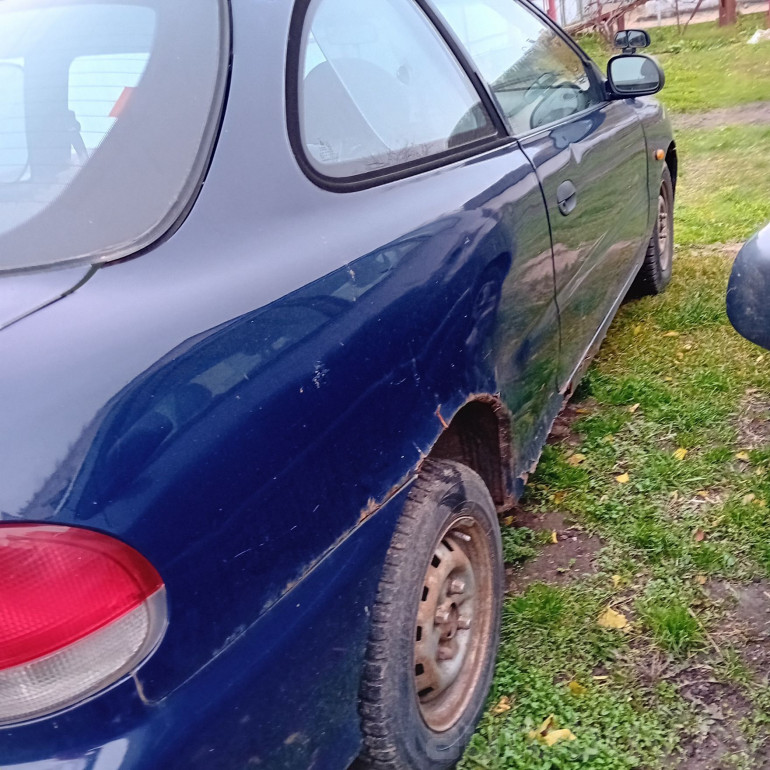 Hyundai Accent 1 поколение, 1998 года