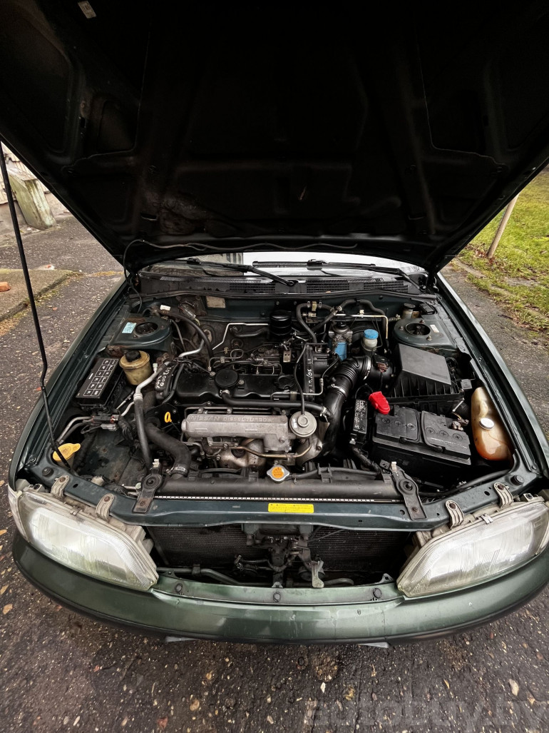 Nissan Primera 2 поколение (P11), 1997 года