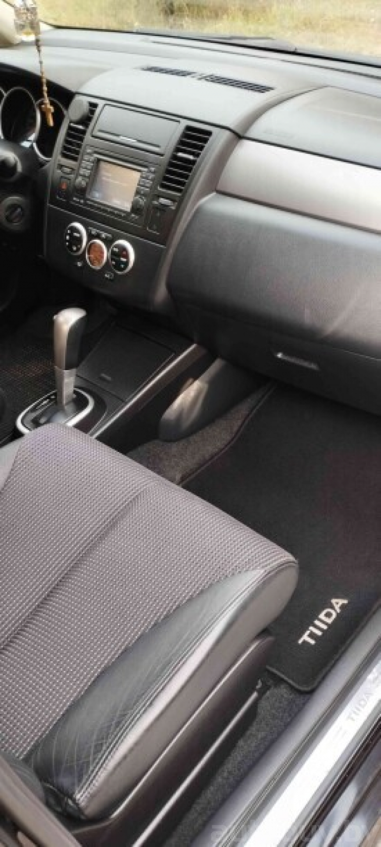 Nissan Tiida 1 поколение [рестайлинг], 2013 года