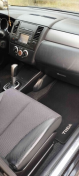 Nissan Tiida 1 поколение [рестайлинг], 2013 года
