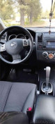 Nissan Tiida 1 поколение [рестайлинг], 2013 года
