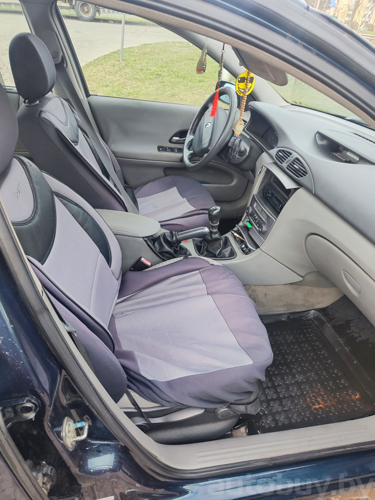 Renault Laguna 2 поколение, 2004 года
