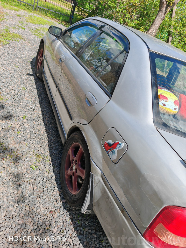 Mazda 323 6 поколение (BJ) [рестайлинг], 2001 года
