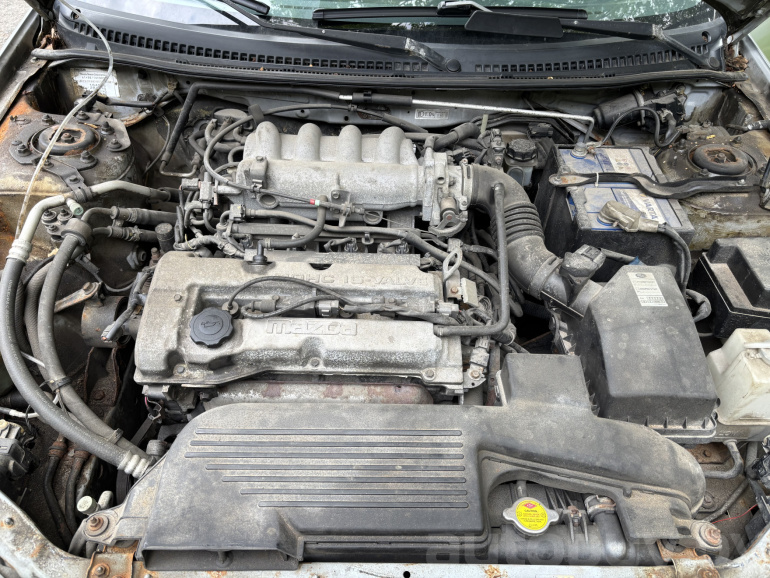 Mazda 323 6 поколение (BJ) [рестайлинг], 2003 года