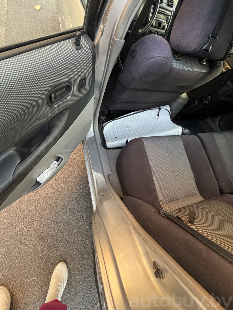 Mazda 323 6 поколение (BJ) [рестайлинг], 2003 года