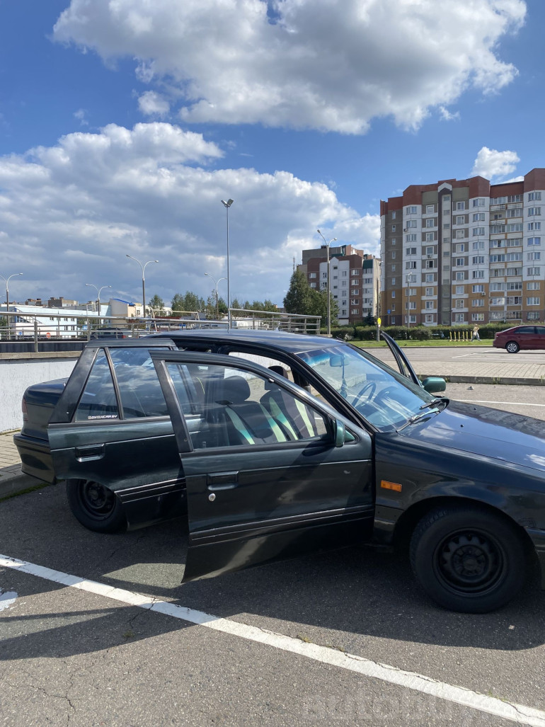 Mitsubishi Lancer 5 поколение, 1993 года